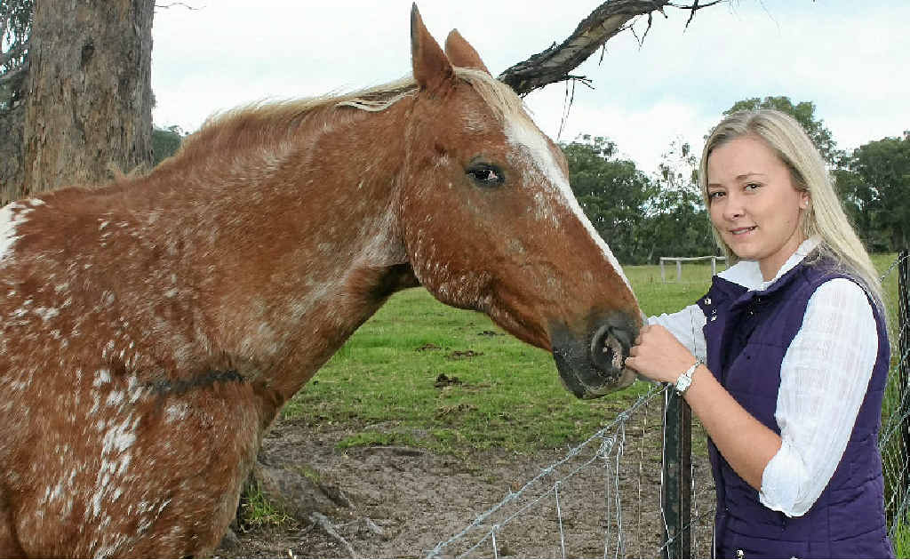 PASSION FOR LAND: Julicia Woods, 19, has a love of all things to do with agriculture and a soft spot for horse Jack. PASSION FOR LAND: Julicia Woods, 19, has a love of all things to do with agriculture and a soft spot for horse Jack.